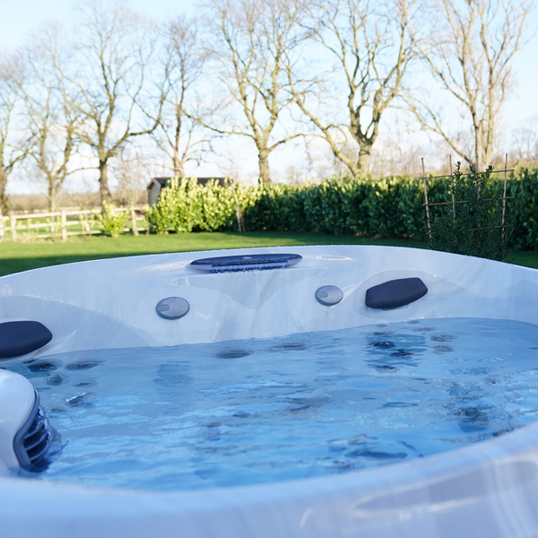 What chemicals are needed to maintain a hot tub?